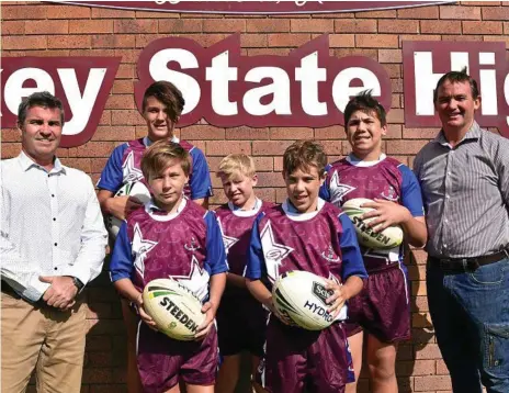  ??  ?? FRESH LOOK: Unveiling Oakey State High School’s new jerseys are (from left) principal Danny Keenen, Carson Prior-Mead, Jack Merrell, Fletcher Voll, Darcy Watherston, Lennox Kirby and Neville Cherry.