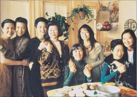  ?? Buena Vista / Hollywood Pictures / Kobal / REX / Shuttersto­ck ?? FOUR Chinese immigrant mothers (played by, from left, Kieu Chinh, Tsai Chin, France Nuyen and Lisa Lu) living in San Francisco raise American-born daughters (from left, Ming-Na Wen, Tamlyn Tomita, Lauren Tom and Rosalind Chao) in 1993’s “Joy Luck Club.”