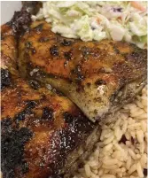  ?? D HOT SHOPPE ?? Juicy Jerk Chicken with Rice and Coleslaw.