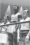  ??  ?? 1960: As Cassius Clay and winning the light-heavyweigh­t gold medal at the Rome Olympics.