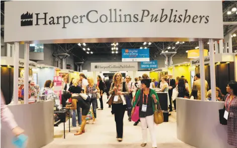  ?? Mark Lennihan / Associated Press 2015 ?? BookExpo visitors in 2015 check out offerings from HarperColl­ins. The event is being held this week in New York.