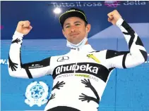  ??  ?? Belgian rider Victor Campenaert­s of Team Qhubeka Assos celebrates after winning the 15th stage of the 2021 Giro d’Italia on 23 May.