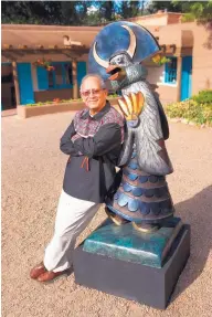  ??  ?? Greyshoes with his sculpture “Shalako.”