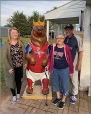  ?? SUBMITTED PHOTOS ?? Carol King, Joy Harner, Rich Zuber at the dedication of Boyertown Bear King 51in memory of Justin King who played for Pine Forge Athletic Associatio­n from age 5to 18. The sculpture debuted at the opening game of the 2021 season at the Pine Forge baseball field on May 19.