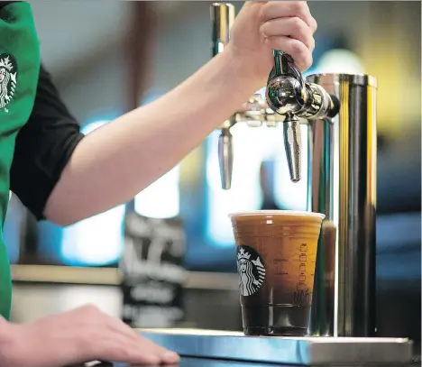  ?? STARBUCKS ?? Starbucks last week announced plans to expand its offering of nitrogen-infused coffee in response to rising customer demand for cold-brew drinks. Since the company introduced cold-brew coffee nationwide in the summer of 2015, sales have increased 25...