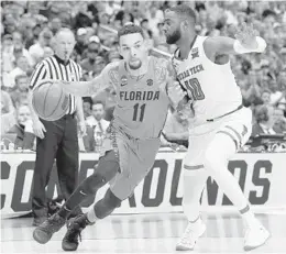  ?? TONY GUTIERREZ/ASSOCIATED PRESS ?? Florida guard Chris Chiozza was in foul trouble Saturday night and ended up playing only 27 minutes.