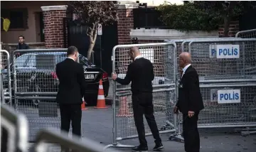  ??  ?? Security members close the police barriers at the Saudi Arabian Consulate in Istanbul. — AFP photo