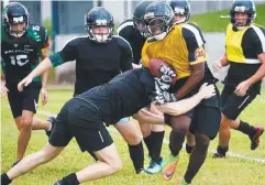  ?? Picture: STEWART McLEAN ?? BIG HIT: Vikings' Saifu Savage takes a tackle.