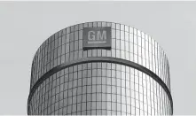  ?? Paul Sancya / Associated Press ?? General Motors’ massive 14,000-person layoff announced last month might not be as bad as originally projected.