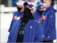  ?? Adam Hunger / Associated Press ?? New York Giants head coach Joe Judge looks on before an NFL game against the Cleveland Browns on Sunday in East Rutherford, N.J. The Browns beat the Giants 20-6, New York’s second loss in a row which dimmed the team’s playoff hopes.