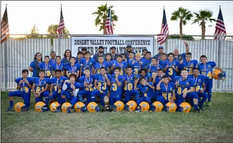  ?? PHOTO COURTESY OF EILEEN GUTIERREZ ?? Members of the Brawley Jr. Peewee team smile for a photo after winning the DVYFC Conference Championsh­ip on Saturday.