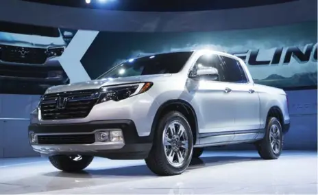  ?? TODD KOROL/TORONTO STAR ?? Honda says many North Americans are driving too much pickup truck for their needs and its 2016 Ridgeline is more suited to light-duty work.