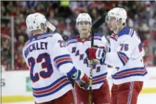  ?? NICK WASS — THE ASSOCIATED PRESS ?? Rangers defenseman Brady Skjei (76) celebrates his goal with left wing Connor Brickley (23) and center Lias Andersson (50) during the second period.