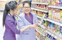  ??  ?? Virun Pongpruksa­thon is assistant store manager at the Foodland Supermarke­t on Sukhumvit Soi 5.