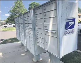  ?? RACHEL RAVINA — MEDIANEWS GROUP ?? U.S. Postal Service mailboxes sit inside a residentia­l community in Montgomery County.