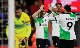  ?? Photograph: Peter Cziborra/Action Images/Reuters ?? Darwin Núñez (right) and Diogo Jota (centre left) celebrate with Cody Gakpo after Jota scored Liverpool’s second goal.