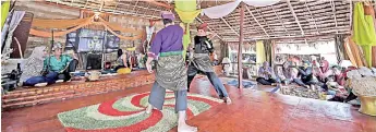  ??  ?? The visitors presented with silat performanc­e during their stay at Buana Kita. - Bernama photo