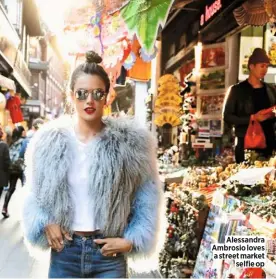  ??  ?? Alessandra Ambrosio loves a street market selfie op