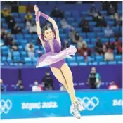  ?? DAVID J. PHILLIP AP ?? Russian Kamila Valieva, who tested positive for a banned substance, competes in the short program.