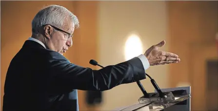  ?? COLE BURSTON THE CANADIAN PRESS ?? Ontario Finance Minister Vic Fedeli speaks during an Economic Club of Canada event in Toronto on Friday.