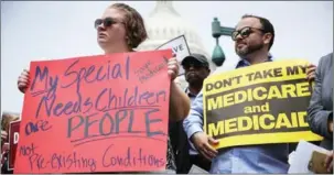  ?? ALEX WONG/GETTY IMAGES/AFP ?? Protesters gather at a ‘Stop Trumpcare’ rally last week in front of the Capitol in Washington, DC.