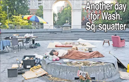  ??  ?? SPREAD OUT: Officials are still letting Matthew Mishefski, who says he’s the “Son of God Lord Saviour Jesus Christ,” live in Washington Square Park.