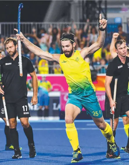  ?? Picture: AFP PHOTO ?? Trent Mitton celebrates a goal during Australia’s tight win over New Zealand.