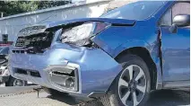  ?? MELISSA MOORE ?? Melissa Moore’s 2017 Subaru Forester after hitting a deer on a rural highway outside Whitehall, Mich.