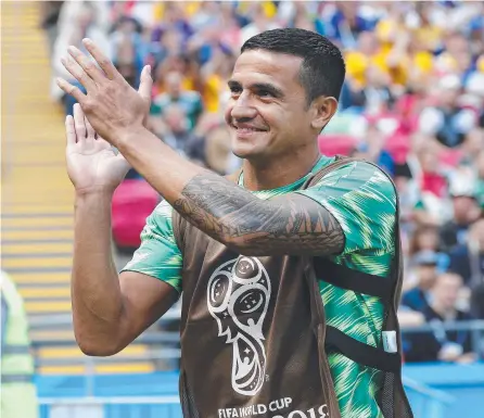  ??  ?? READY: Tim Cahill warms up on the sideline during the Socceroos’ opening 2018 World Cup match against France.