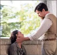  ??  ?? Artist Ana ( Charlotte Le Bon) and Associated Press reporter Chris ( Christian Bale) form two sides of a love triangle in Terry George’s historical drama The Promise.