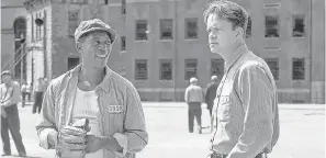  ?? WARNER HOME VIDEO ?? Morgan Freeman, left, and Tim Robbins form a classic inmate partnershi­p in 1994’s “The Shawshank Redemption.”