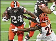  ?? ?? Nick Chubb, seen last year giving Bengals safety Vonn Bell a stiff-arm, headlines the Browns’ league-best running game with 584 yards and a 5.5-yard average per carry.