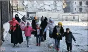  ?? PICTURE: EPA ?? Civilians leave eastern neighborho­ods of Aleppo, Syria. A reader says it is time world leaders find solutions to end the Syrian war.