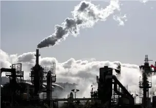  ?? REUTERS ?? VAPOR is released into the sky at a refinery in Wilmington, California on March 24, 2012.