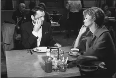  ?? ?? Frank Sinatra appears with Barbara Rush in a scene from the film “Come Blow Your Horn” in 1962.