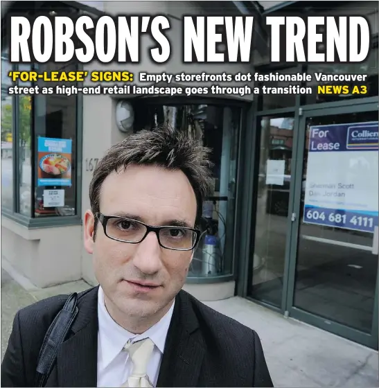  ?? MARK VAN MANEN —PNG ?? Realtor Sherman Scott stands in front of one of more than 20 empty storefront­s on Vancouver’s Robson Street.