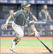  ?? CHRIS O’MEARA — THE ASSOCIATED PRESS ?? The A’s Khris Davis watches his league-leading 42nd home run the 10th inning, making the difference in a 2-1 win.