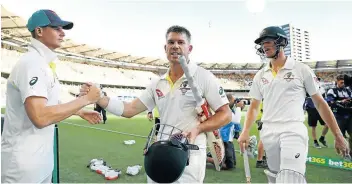  ?? Picture: RYAN PIERSE/GETTY IMAGES ?? IN EYE OF THE STORM: Steve Smith, David Warner and Cameron Bancroft of Australia were at the centre of the ‘Sandpaperg­ate’ saga at Newlands earlier this season.