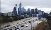  ?? MATT ROURKE — THE ASSOCIATED PRESS ?? Motor vehicle traffic moves along the Interstate 76 highway in Philadelph­ia. Looking beyond the $1.9 trillion COVID relief bill, President Joe Biden and lawmakers are laying the groundwork for another of his top legislativ­e priorities — a long-sought boost to the nation’s roads, bridges and other infrastruc­ture that could meet GOP resistance to a hefty price tag.