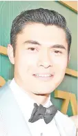  ??  ?? Henry Golding