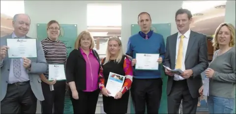  ??  ?? ·Louth’s Junior Achievemen­t Volunteers Brian Martin, Elaine Daly, Barry Eaton and Pamela Dagg being presented with their certificat­es