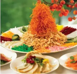  ??  ?? PROSPERITY SALMON YU SHENG