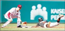  ??  ?? Washington Nationals shortstop Trea Turner catches the ball, thrown by Nationals catcher Jose Libation, to get Miami Marlins’ Dee Gordon out at second base during a failed steal attempt in first inning of a baseball game
at Nationals Park, on Aug 30,...