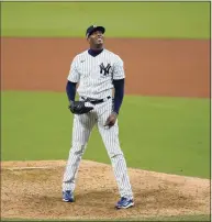  ?? Gregory Bull / Associated Press ?? New York Yankees closing pitcher Aroldis Chapman reacts on the mound after the Yankees beat the Tampa Bay Rays 5-1 in Game 4 of the American League Division Series on Oct. 8.