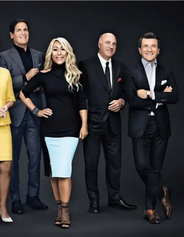  ??  ?? BUSINESS REALITY Cuban (rear) with fellow Sharks (from left to right) Daymond John, Barbara Corcoran, Lori Greiner, Kevin O’leary and Robert Herjavec.