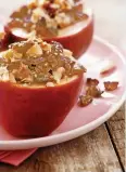  ??  ?? A whole apple, baked and served with chopped nuts