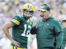 ?? MIKE ROEMER/THE ASSOCIATED PRESS ?? Packers quarterbac­k Aaron Rodgers says he has “a great relationsh­ip” with head coach Mike McCarthy.