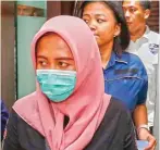  ?? GUSLAN GUMILANG/JAWA POS ?? BUKAN PELAKU UTAMA: Nur Fadilah harus mempertang­gungjawabk­an perbuatann­ya di Polda Jatim kemarin.