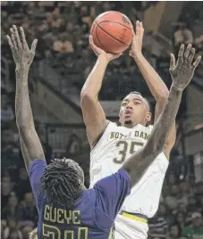  ??  ?? Notre Dame All- America forward Bonzie Colson suffered a fractured left foot in practice this week.