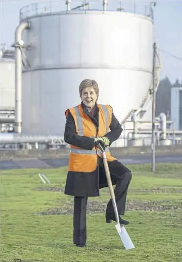  ?? ?? ↑ First Minister Nicola Sturgeon is handy with a spade, but it’s her spad that’s in trouble